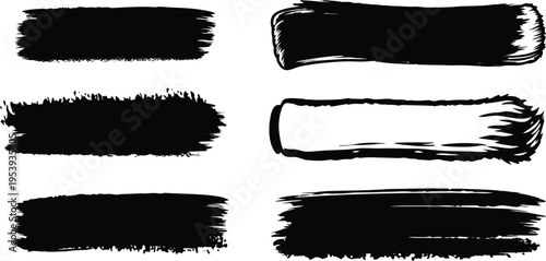 Collection of black ink brush strokes and paint textures on a white background for design