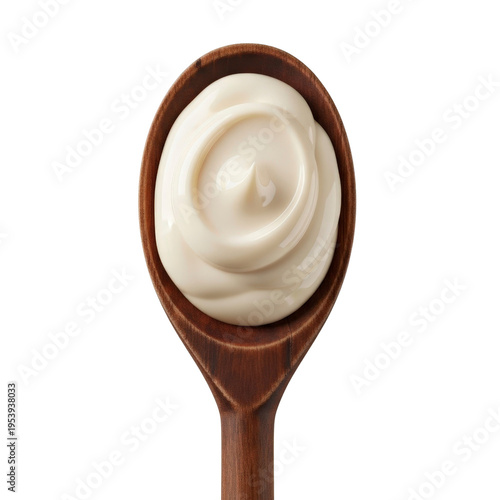 Mayonnaise on a wooden spoon isolated on white