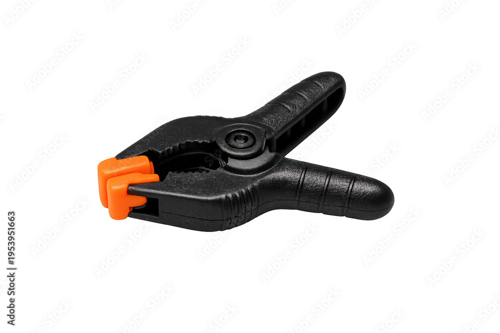 Obraz premium Black spring clamp with orange grip on transparent background
