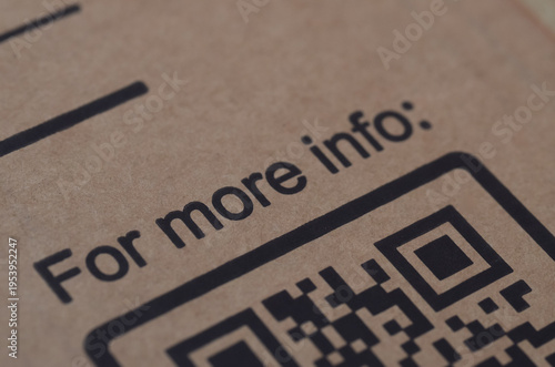Close up of QR code on brown cardboard packaging for digital information