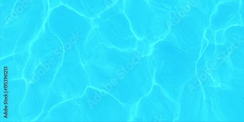 Blue water surface with bright sunlight reflections and ripples in swimming pool or tropical ocean