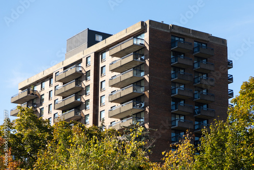 Residential apartment building with balconies in Ottawa neighborhood, Canada