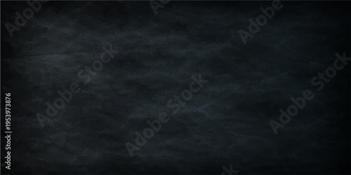 A textured chalkboard background, providing a versatile backdrop for text or design, evokes a sense of education and communication.