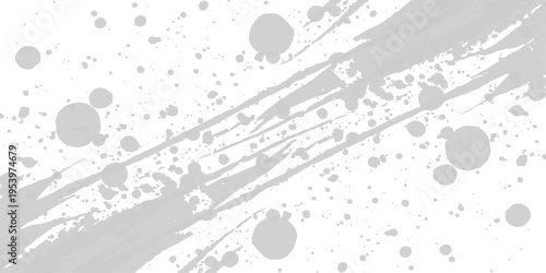 Abstract light gray ink splatter and brush strokes on white background, artistic paint texture