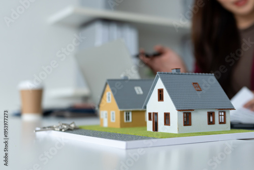 Close-up of Miniature House Models on Desk