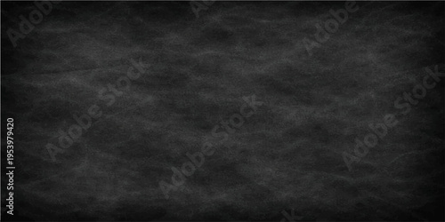 The captivating texture of a used chalkboard. the perfect backdrop for conveying messages, and creative ideas. The dark surface invites endless possibilities for visual storytelling.