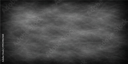 An aged chalkboard provides a textured surface for displaying messages or designs, an invitation to start education, creativity, and idea generation.