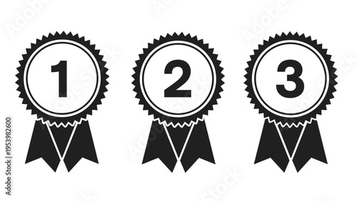 Three black and white award ribbons are numbered one, two, and three to represent first, second, and third place rankings in a competition.