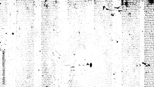 Newspaper page with blurred text and ink splatters on white paper background