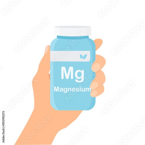 hand holding magnesium supplement bottle. mg vitamin container, healthcare and nutrition 