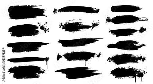 Brush strokes set with black ink splatters and smudges on white background featuring grunge, artistic, vector with