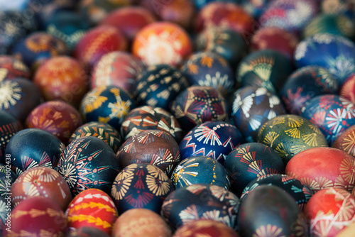 Traditional Lithuanian wooden colorful Easter eggs, symbol of fertility and life painted with the symbols of nature, close up