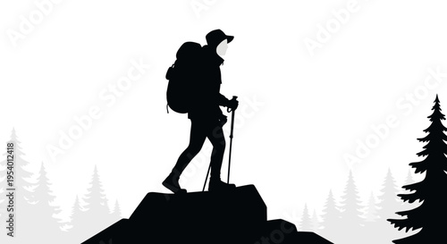 Hiker standing on mountain peak summit.
