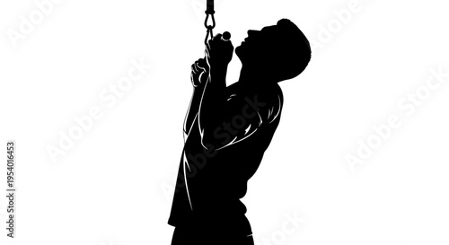 Silhouette of a Man Performing Pull-ups on a Bar