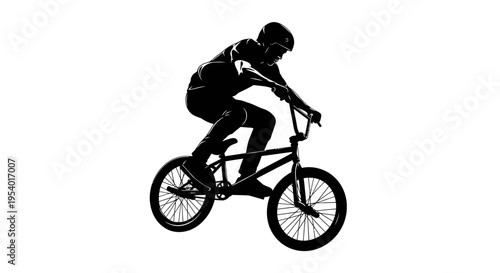 Silhouette of a BMX Rider Performing a Stunt Jump