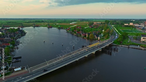 Aerial view of windmills at famous tourist site Zaanse Schans in Holland on sunset. Zaandam, Netherlands