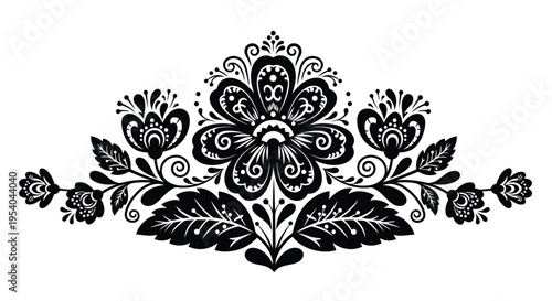 Intricate black and white floral design with symmetrical elements and ornate details