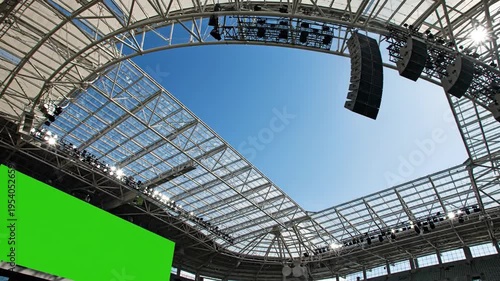 Stadium interior under blue sky view of architecture and green screen
