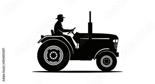 Man wearing a hat driving tractor on the countryside road