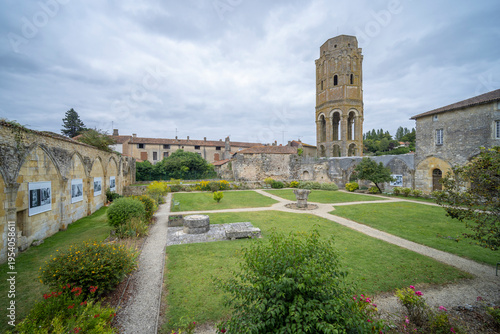 Tour Charlemagne in Charroux, France, with cloister garden