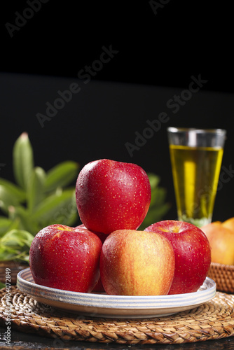 Fresh Red Apples Still Life with Tea Glass on Dark Background