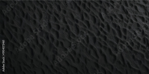A rough dark asphalt street surface features a closeup pattern of textured black leather and fabric material with a grey stone tarmac backdrop for a construction detail wallpaper