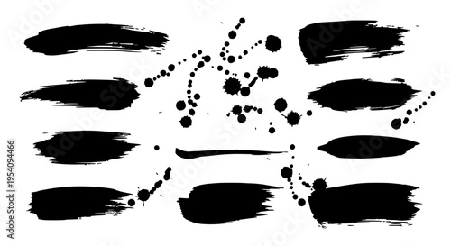 Brush strokes set with black ink splatters and dots on white background featuring artistic, painting, drawing with