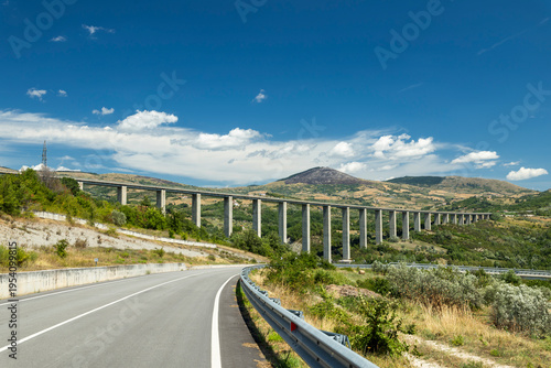 Highway viaduct extending across valley in Agnone, Italy