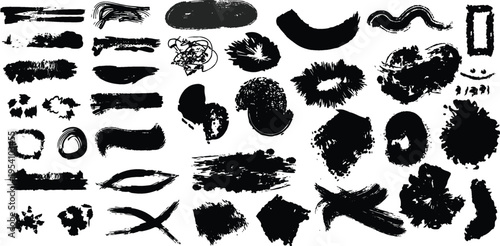 Collection of various black smudge and smear marks on white background