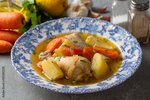 Foto Traditional Turkish Chicken Stew with Potatoes and Carrots - Tavuk Haslama