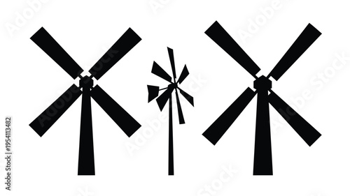 Three black windmills stand against a white backdrop a striking silhouette