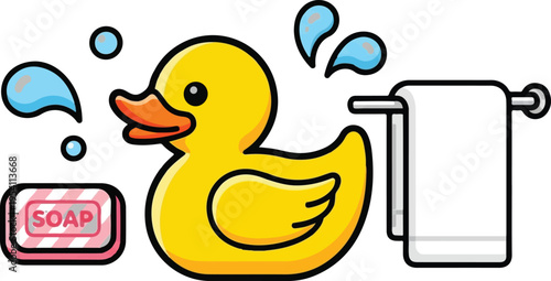 A cute yellow rubber duck sitting next to a bar of pink soap and a white towel on a metal rack