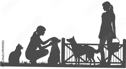 Silhouette of two girls and their dogs by a fence