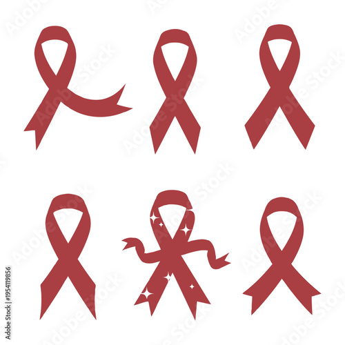 Several red ribbons are tied in various styles on a plain background