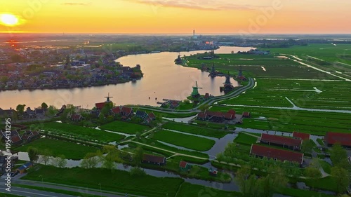 Aerial view of windmills at famous tourist site Zaanse Schans in Holland on sunset. Zaandam, Netherlands
