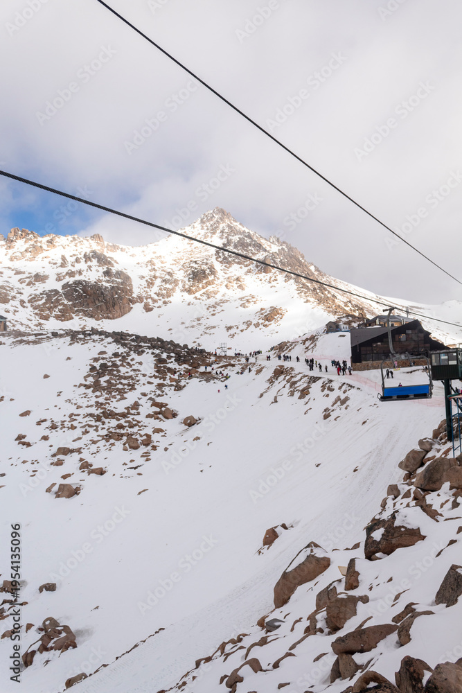Fototapeta premium ski lift in the alps Cerro Catedral San Carlos de Bariloche Patagonia Argentina, next to the Andes Mountains, base city for skiing in the mountains