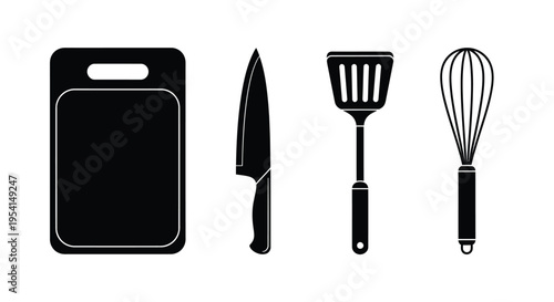 Kitchen tools arranged on a clean surface including cutting board knife