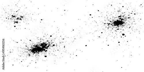 A collection of black ink splatters and paint droplets isolated on a clean white background layer