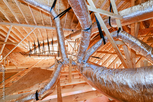 Ductwork installation in residential building under construction