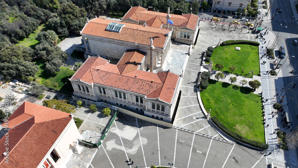 Fototapeta premium Aerial drone photo of historic Neoclassic building of Academy of Athens featuring statue of goddess Athena in Acadimias street, Attica, Greece
