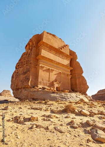 Tomb Lihyan Son of Kuza or Qasr al-Farid at Hegra, Saudia Arabia - most popular landmark in Mada'in Salih archaeological site, bright sunny day