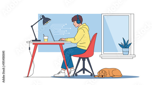 Dedicated student wears headphones and works on a laptop at a desk while his pet dog sleeps peacefully on the floor nearby at home.