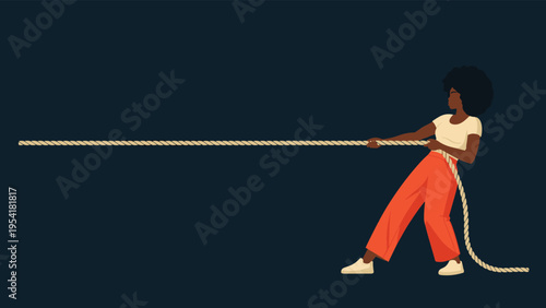 Strong woman with an afro pulling a long rope during a competitive tug of war game against a dark background.