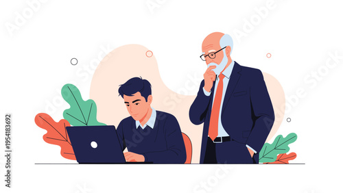 Senior businessman mentor guiding a young male employee working on a laptop in a modern office environment.