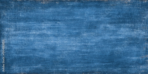 A dark blue vintage denim fabric texture features a rough cotton textile pattern in a closeup design, serving as a classic fashion material background or clothing backdrop