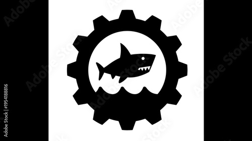 A black and white emblem featuring a shark in the center of a gear-like shape, waves at the bottom