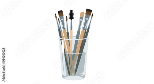 Paint brushes in glass cup with wooden handles in bright studio lighting for art supplies