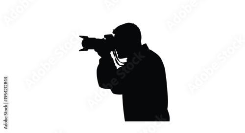 Photographer taking a picture side view dark form striking silhouette