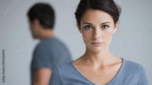 Man Woman Setting Background looking directly camera her hand front