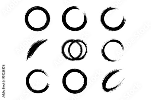Collection of nine black brush stroke circles and ellipses on a white background